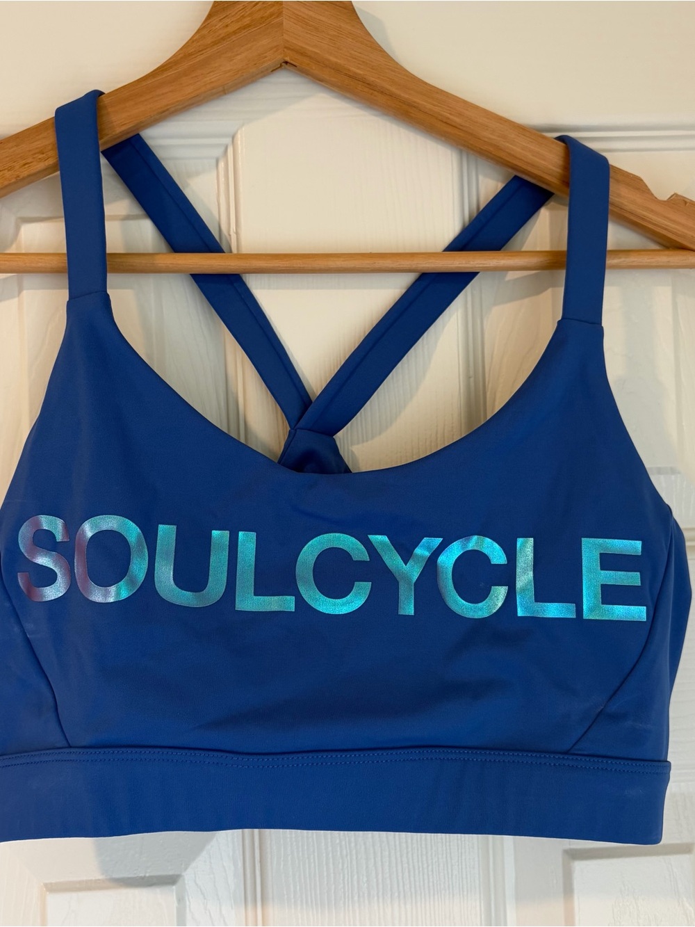 soulcycle cobalt blue sports bra with logo tag